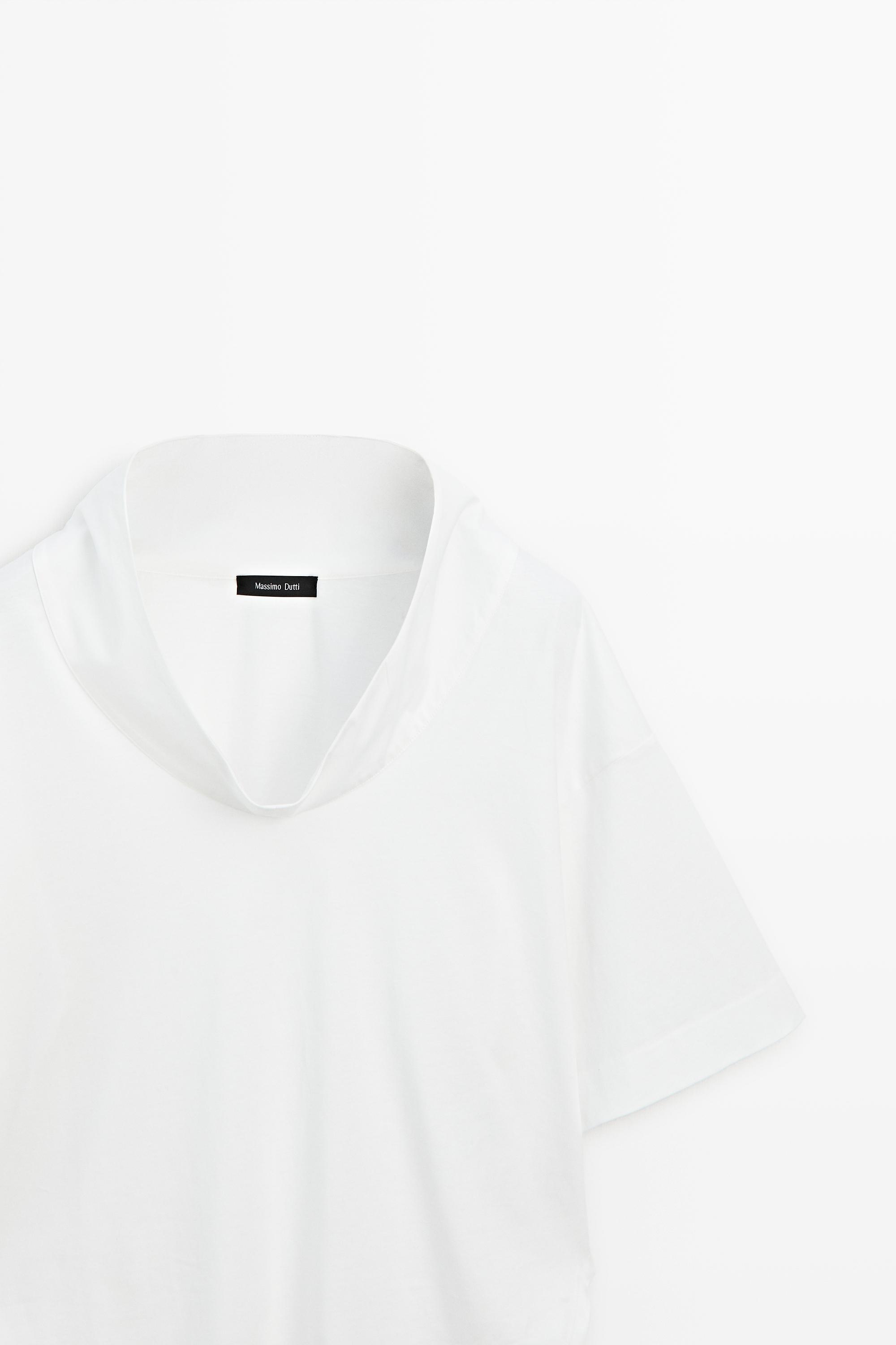 Blouse en coton à col ouvert et manches courtes